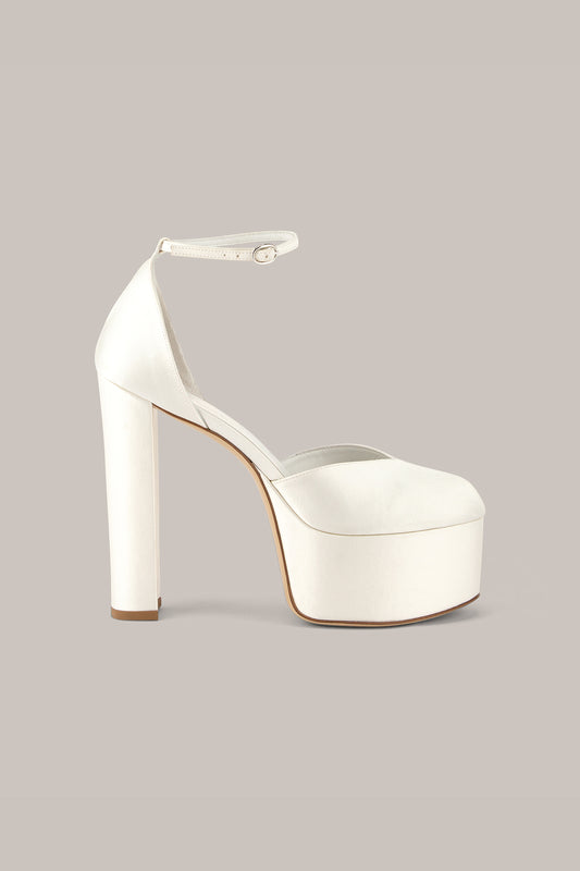 Her White High Heels