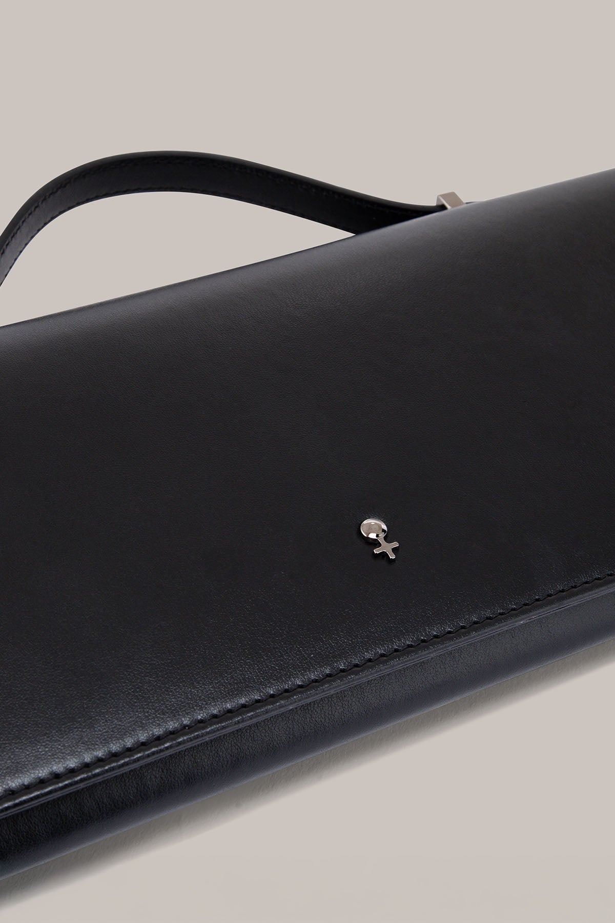 Her Black Leather Bag