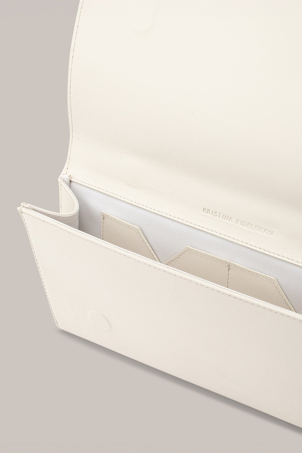 Her White Leather Bag