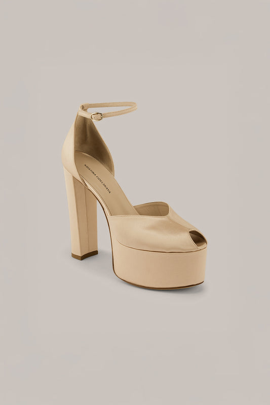 Her Beige High Heels