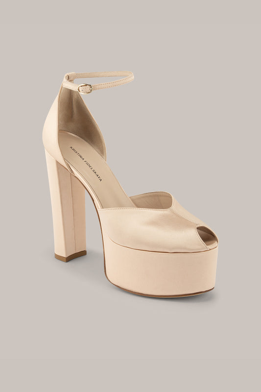 Her Beige High Heels