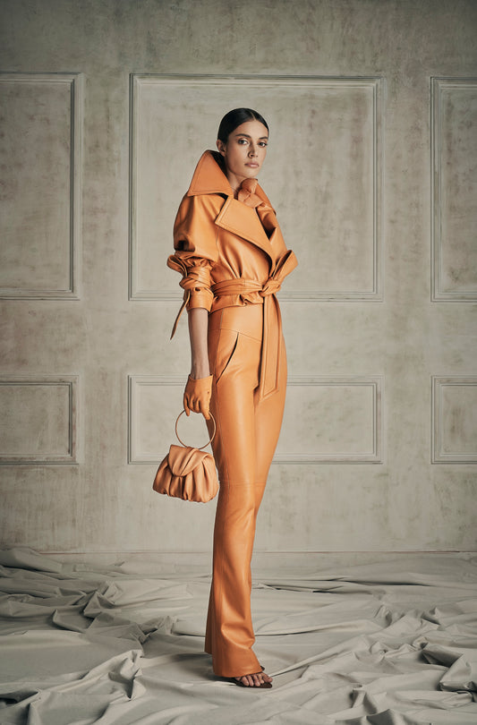Her Orange Leather Bag